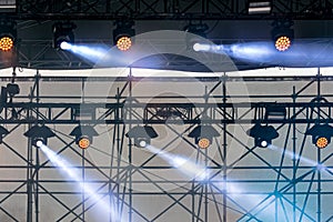 Professional lightning equipment on outdoor concert stageÂ 